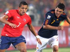 Alexis Sánchez y David Villa disputando un partido en el Mundial de Sudáfrica 2010.
