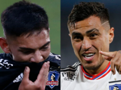 Primer plano al rostro de tristeza y lamento de Joan Cruz en Colo-Colo, mientras que en el sector derecho de la imagen aparece Darío Lezcano celebrando un gol y apuntando con el dedo a un jugador albo.