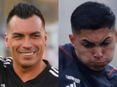 Primer plano a los rostros de Esteban Paredes y Jordhy Thompson, ex jugador de Colo-Colo y actual canterano del Popular, respectivamente.
