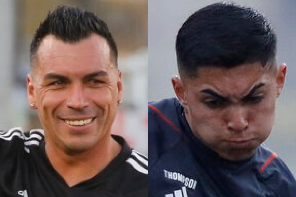 Primer plano a los rostros de Esteban Paredes y Jordhy Thompson, ex jugador de Colo-Colo y actual canterano del Popular, respectivamente.