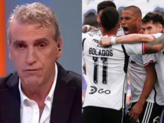 Primer plano al rostro de Jorge Pellicer, mientras que en el sector derecho de la imagen aparecen jugadores de Colo-Colo celebrando un gol durante el Superclásico 194 ante la Universidad de Chile.