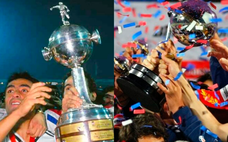 A mano izquierda Jaime Pizarro sostiene la Copa Libertadores conquistada por Colo-Colo en 1991, mientras que en el sector derecho el plantel de la Universidad de Chile levanta la Copa Sudamericana que ganaron en 2011.