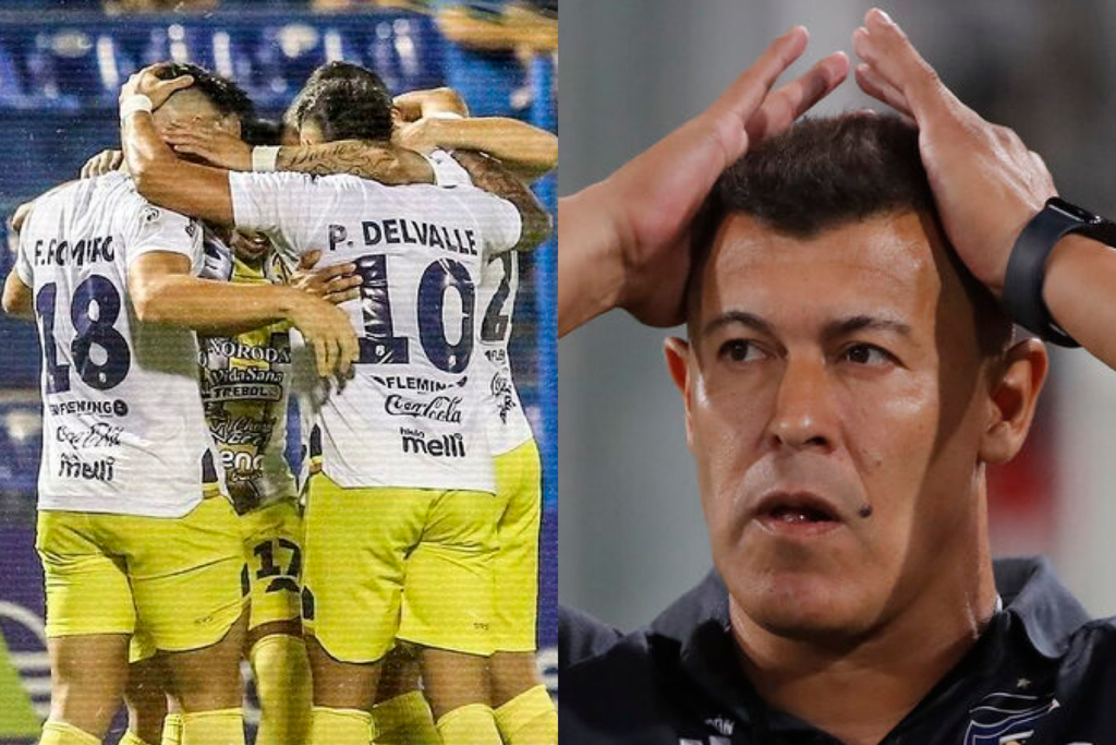 Futbolistas de Sportivo Trinidense se abrazan tras anotar un gol, mientras que a mano derecha aparece el rostro asombrado de Jorge Almirón, técnico de Colo-Colo que se toma con ambas manos su cabeza.