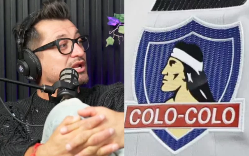 Nicolás Peric hablando en un micrófono junto al escudo de Colo-Colo