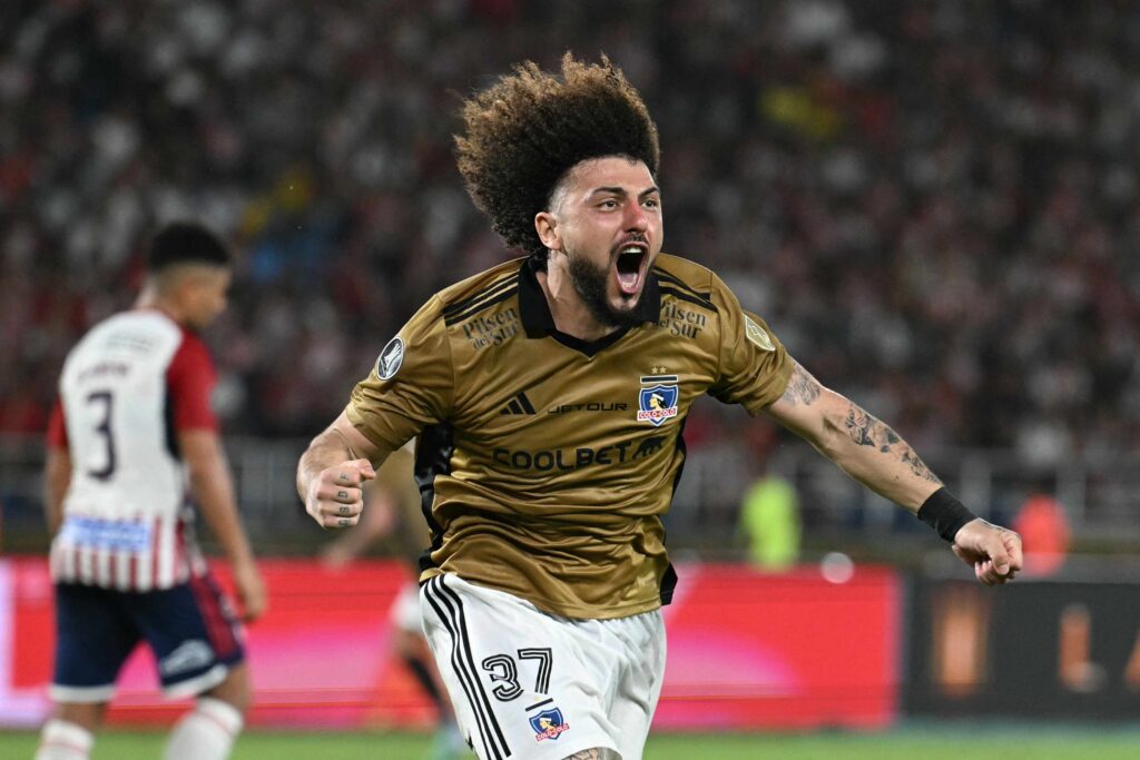 Maximiliano Falcón celebrando su gol contra Junior de Barranquilla.