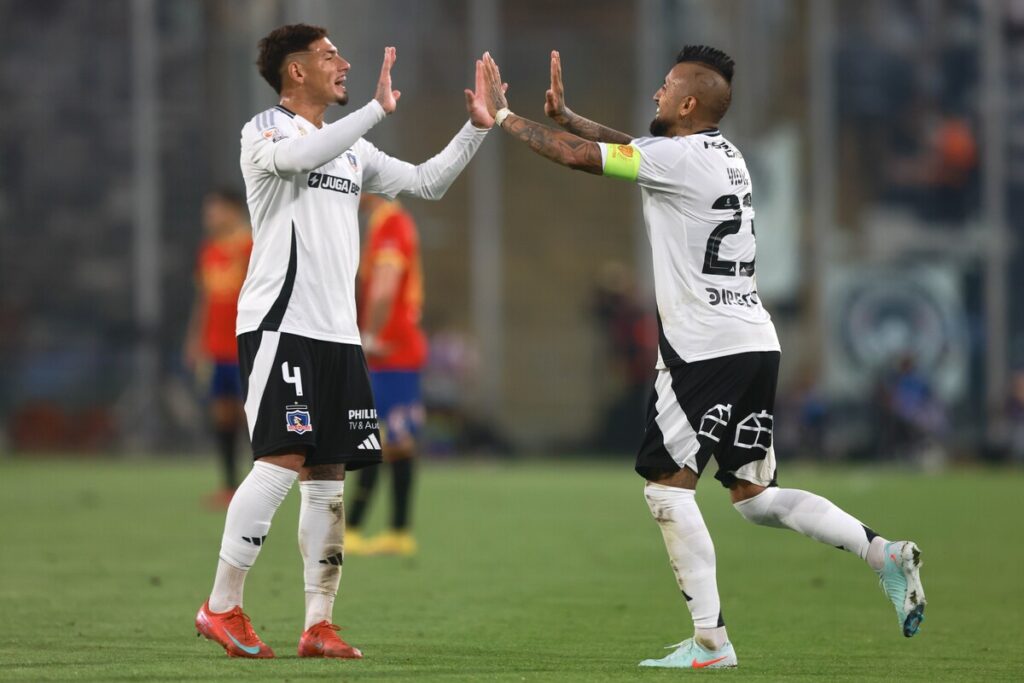 Saldivia y Vidal festejando.